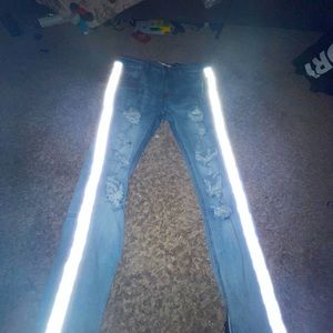 - Blue ripped KDNK flared jeans